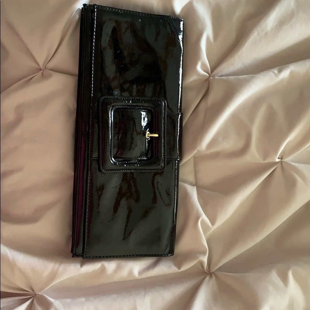 Elongated black patent leather clutch